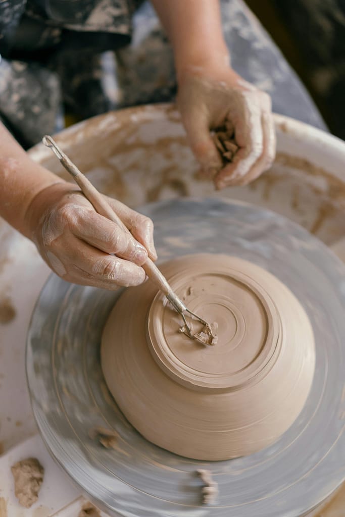 Blue Rabbit Psychotherapy How We Work Section Background | Making of earthen pot on a wheel